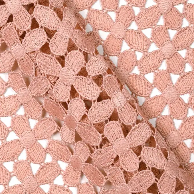 Tessuto guipure rosa margherite