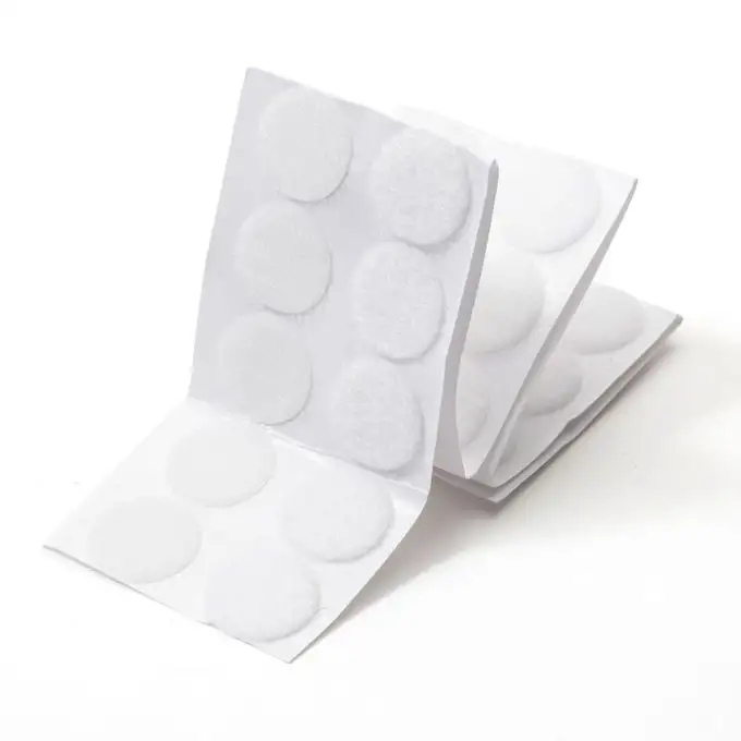 Pastiglie adesive bianche