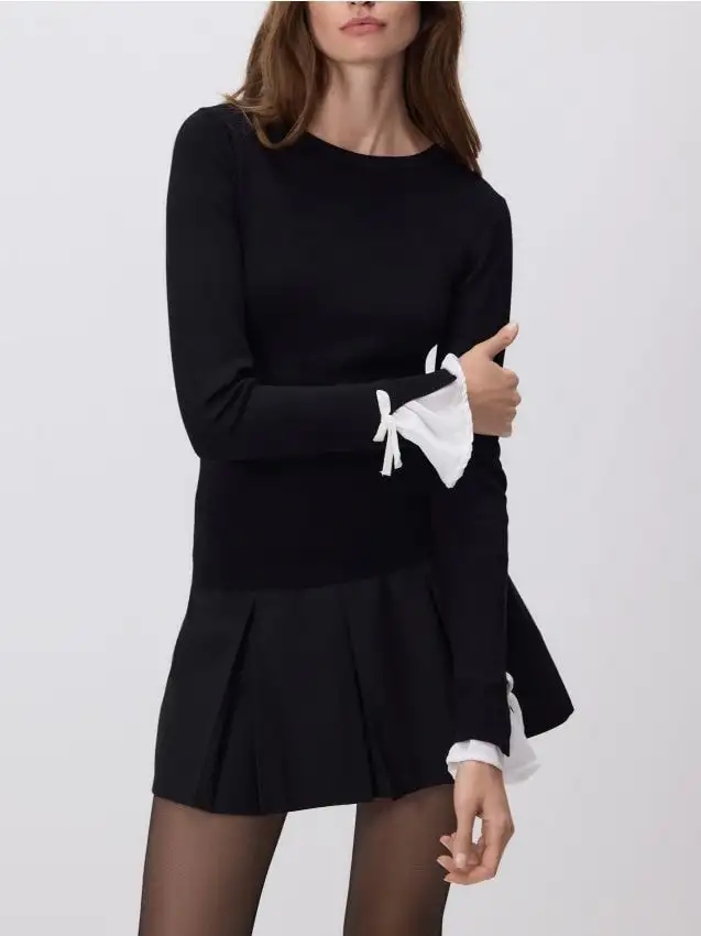 Maglione con fiocco decorativo Colore nero