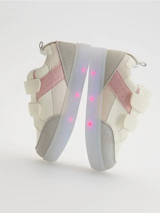 Sneakers con suola luminosa Colore panna