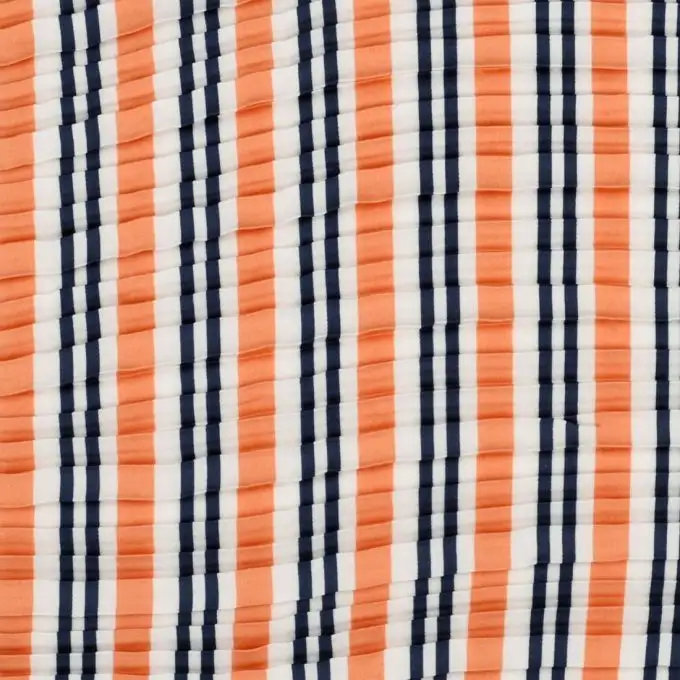 Tessuto crêpe plissettato arancione e blu