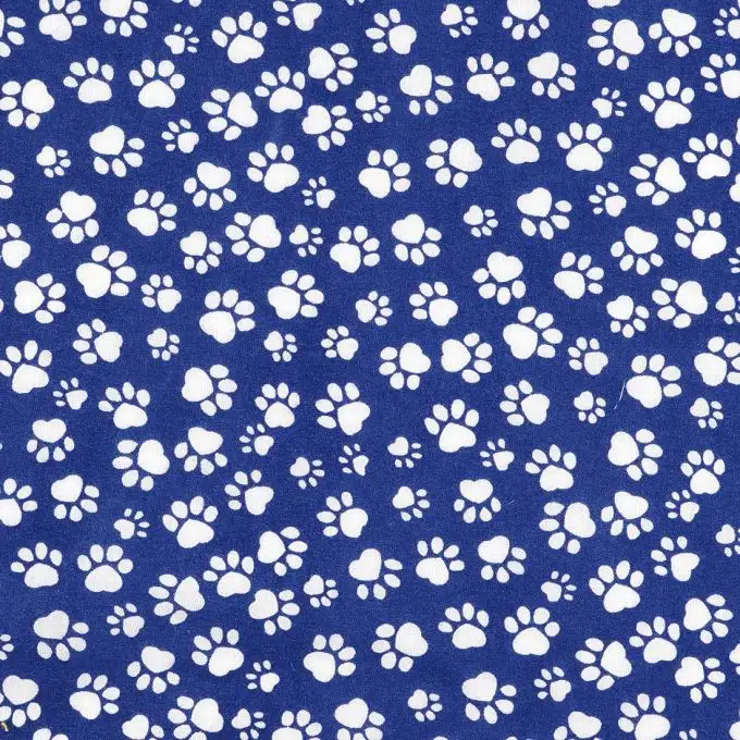 Tessuto popeline di cotone blu impronta cane