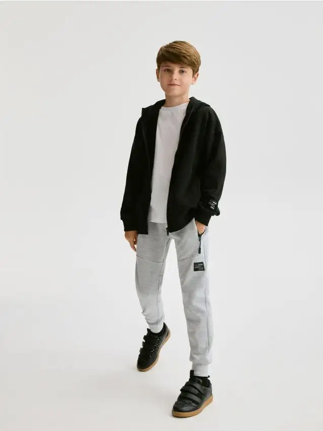 Pantaloni in cotone con tasche Colore grigio chiaro