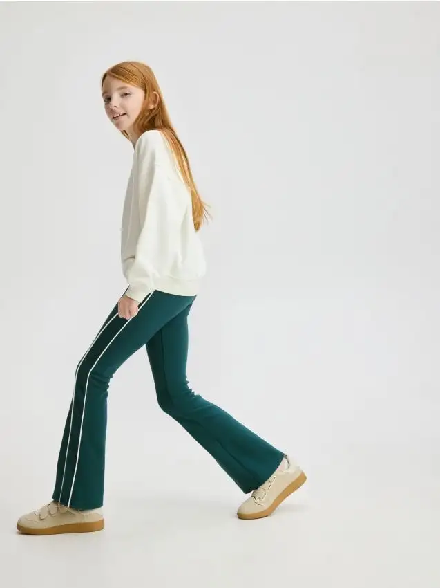 Leggings con strisce laterali Colore verde petrolio