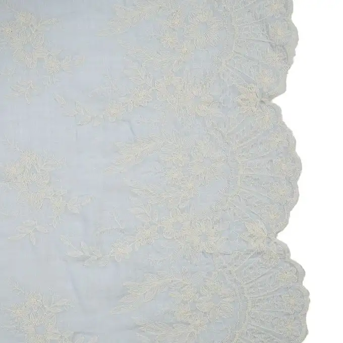 Tessuto voile ricamato azzurro