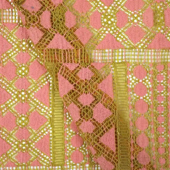 Tessuto pizzo bicolore geometrico corallo e giallo