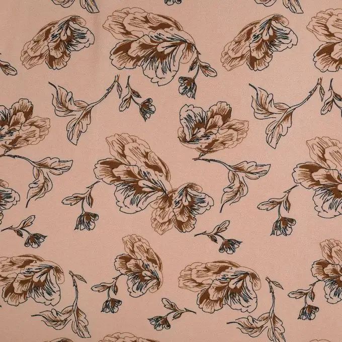 Tessuto crêpe rosa chiaro a fiori