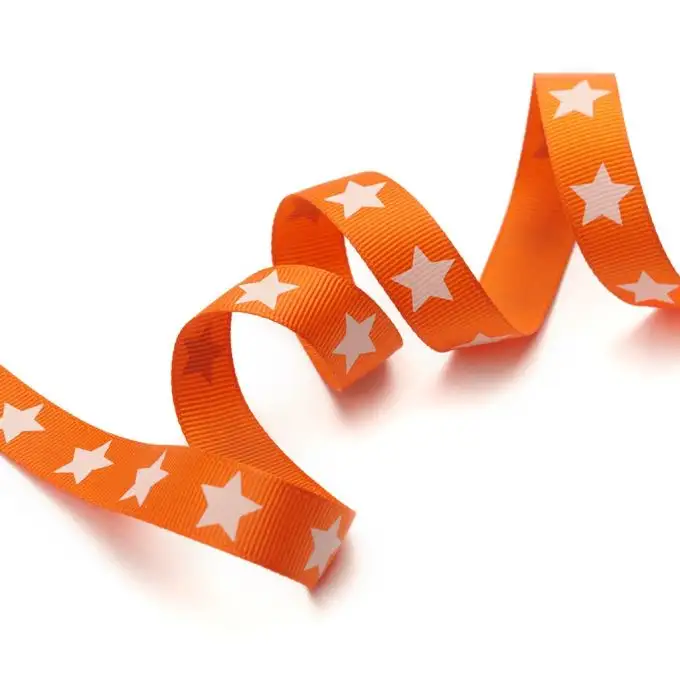 Nastro gros grain arancione e stelle bianche 16 mm