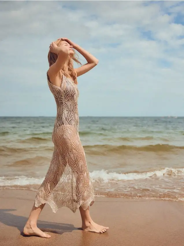 Copricostume lungo con paillettes Colore oro