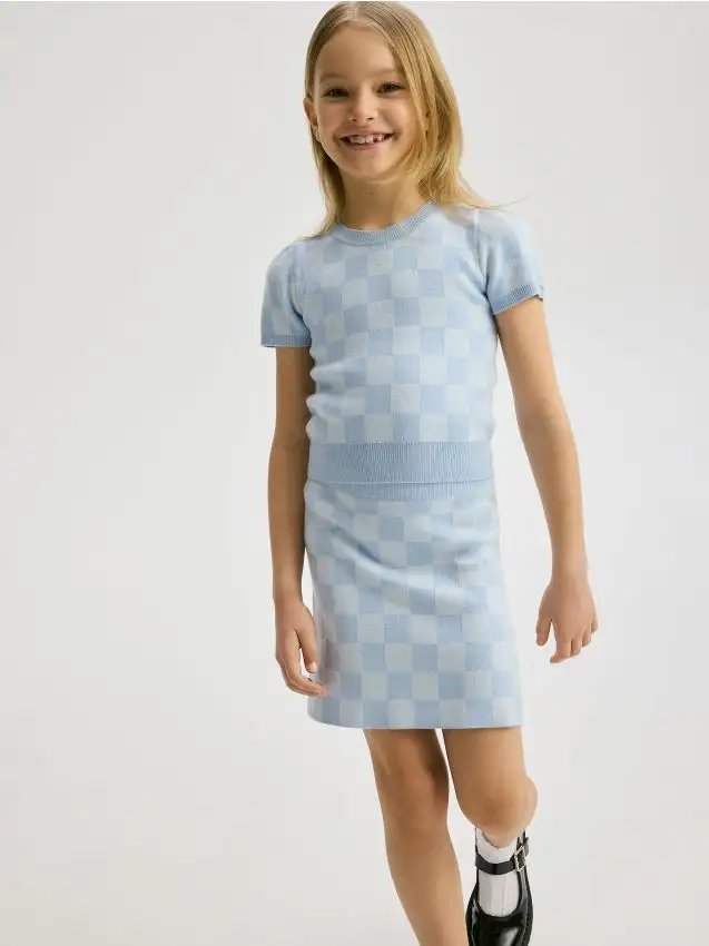 Maglione a maniche corte Colore blu pallido