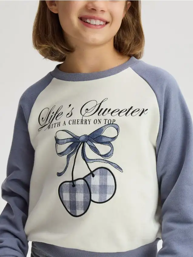 Felpa corta con scritta Colore blu