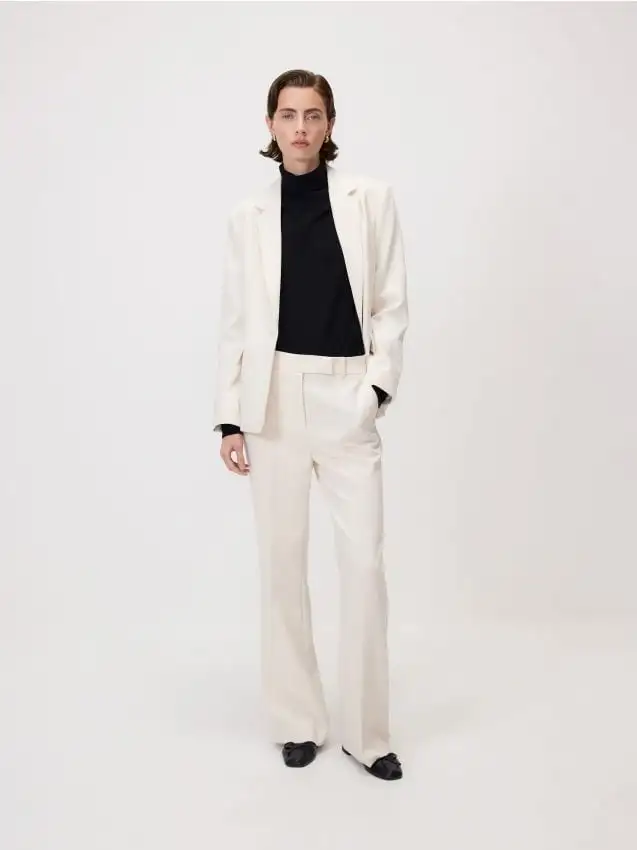 Pantaloni svasati flare con piega Colore panna