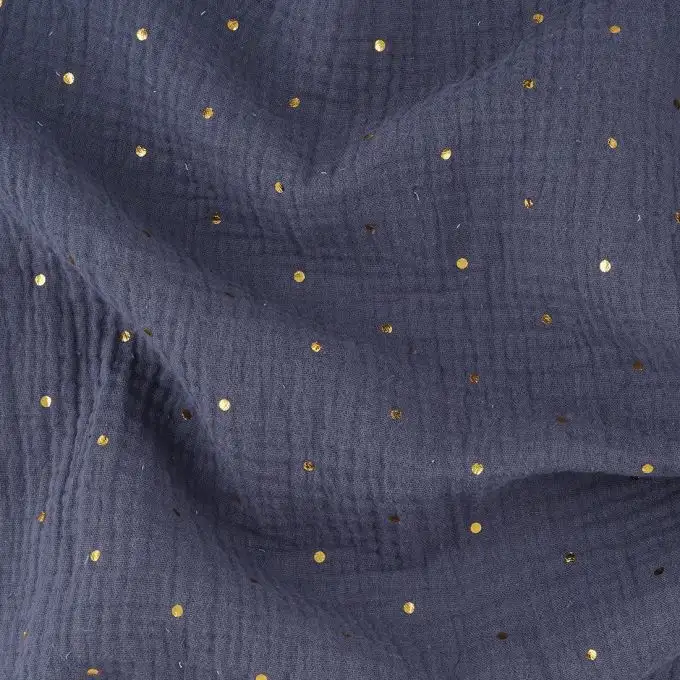 Tessuto doppia garza blu scuro a pois dorato