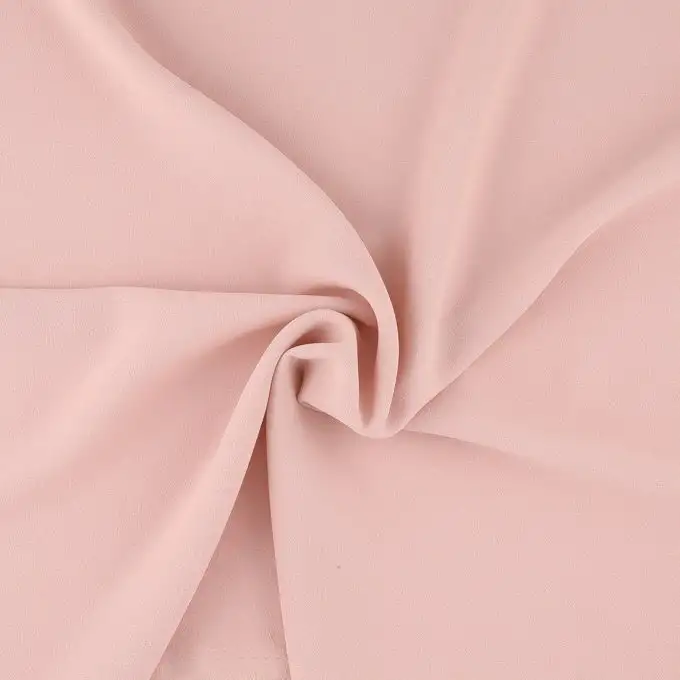Tessuto crêpe rosa cipria