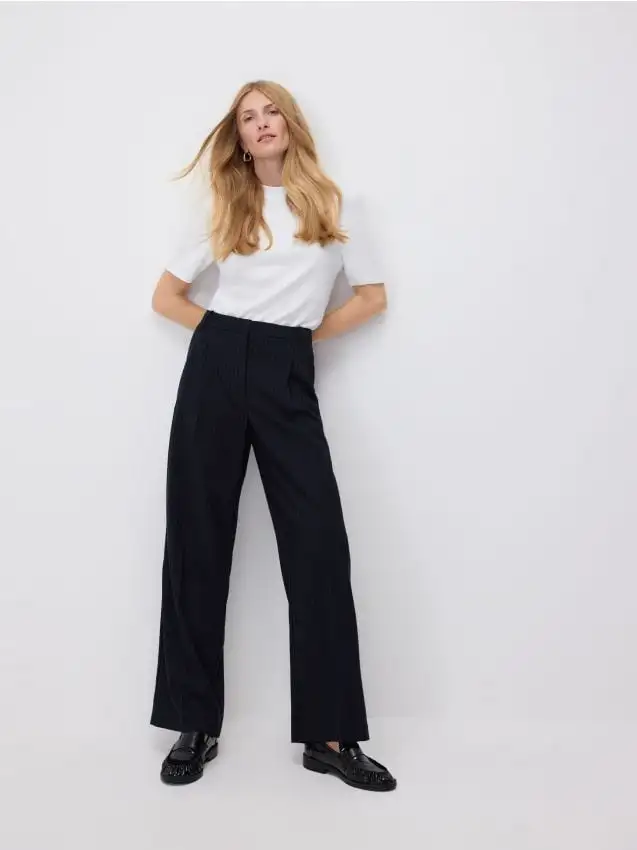 Pantaloni con piega stirata Colore multicolore