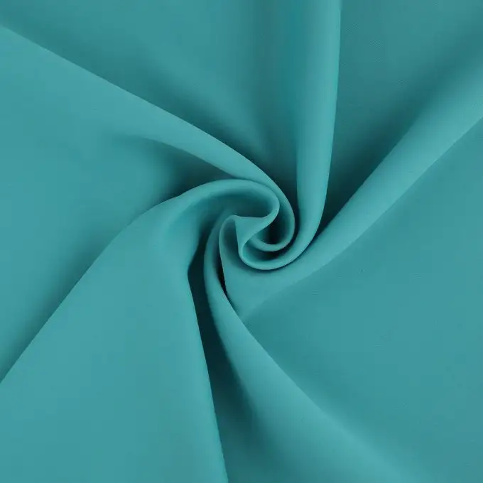 Tessuto oscurante tinta unita turchese