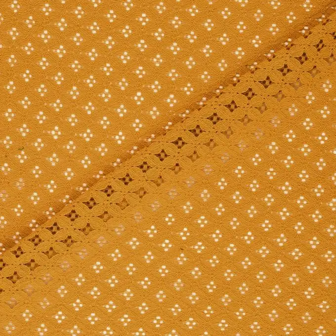Tessuto ricamo inglese giallo senape piccoli motivi