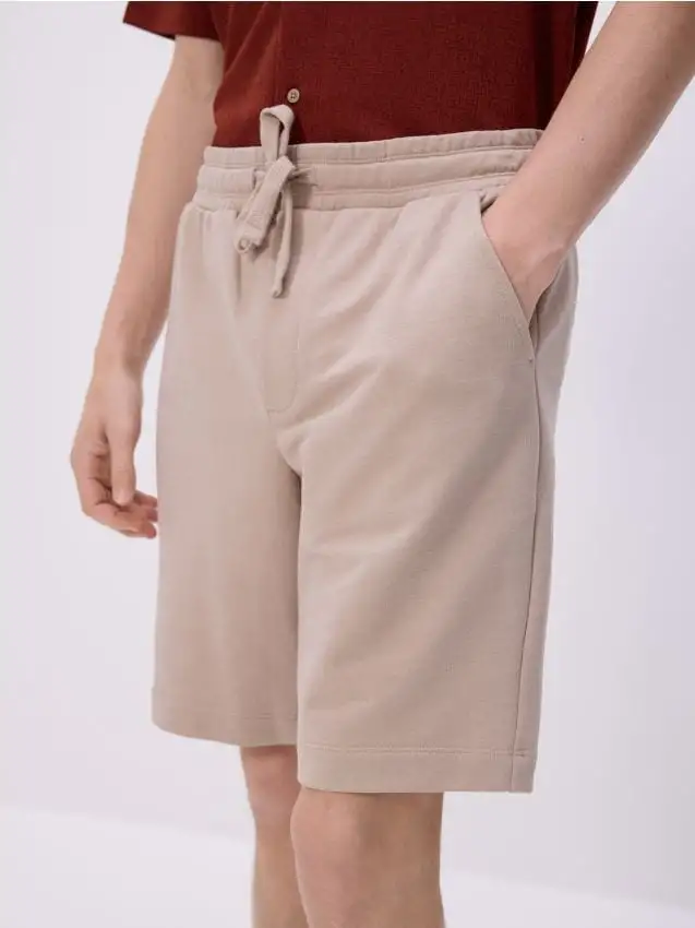 Pantaloncini tuta regular fit Colore beige