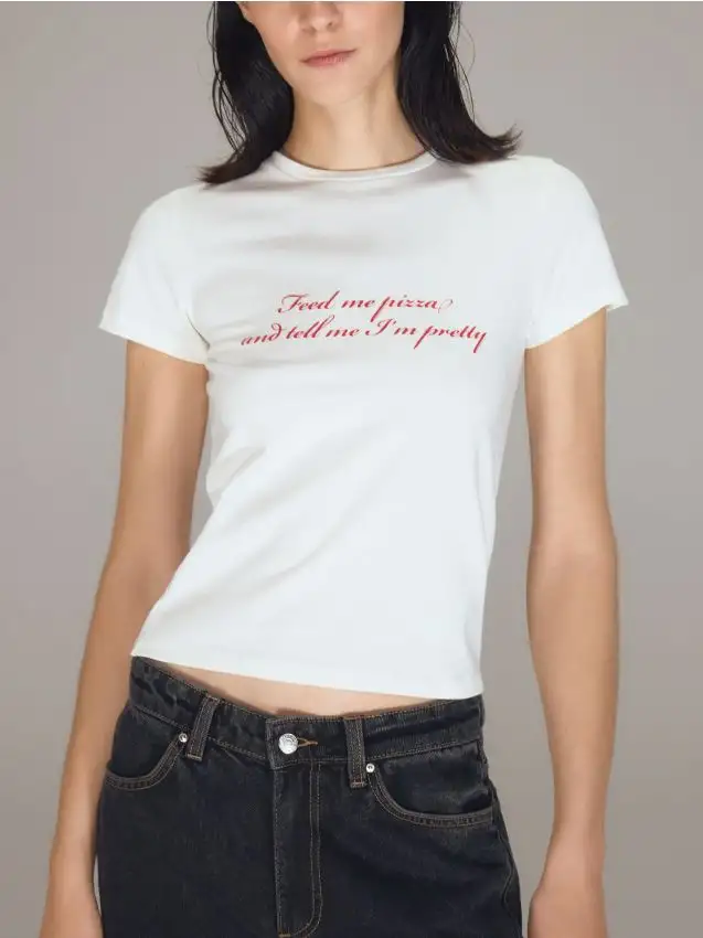 T‑shirt con slogan Colore panna