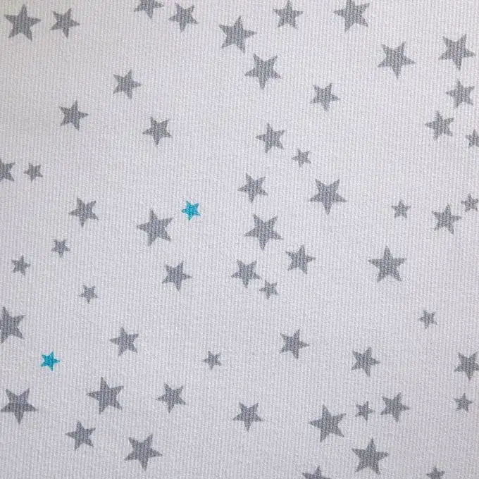 Tessuto a pois per bambini con stampa stelle