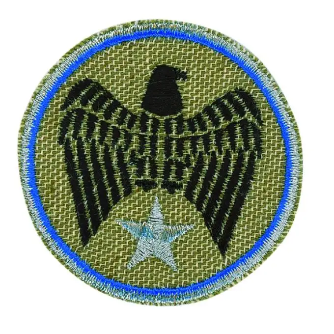 Scudetto rotondo con aquila beige