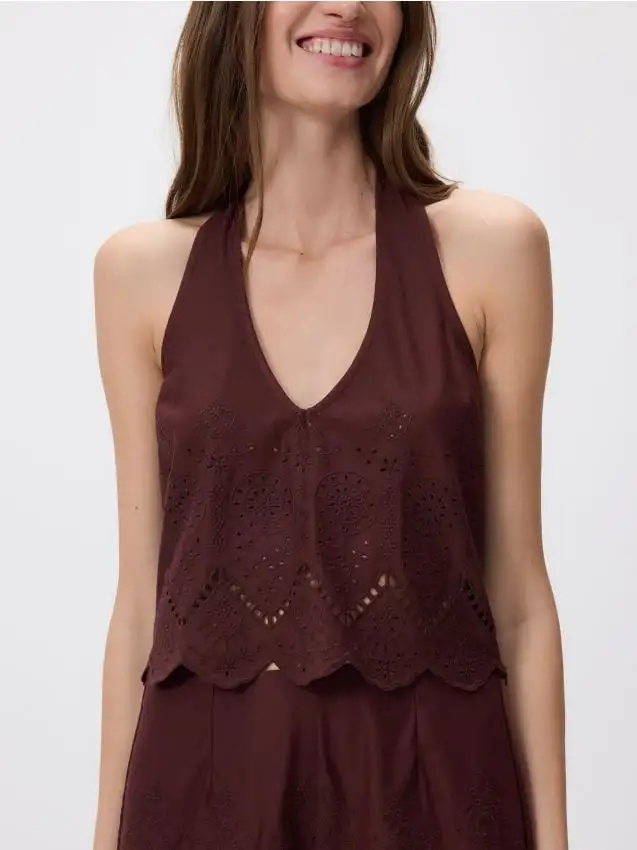 Top traforato con fiocco Colore marrone