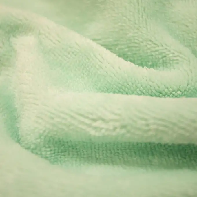 Tessuto spugna bambù peluche verde pallido