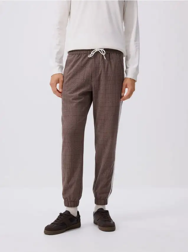 Pantaloni jogger con bande laterali Colore marrone