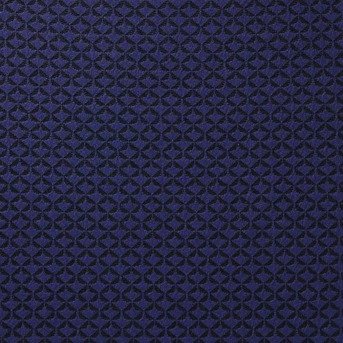 Tessuto a maglia con motivo a rombi