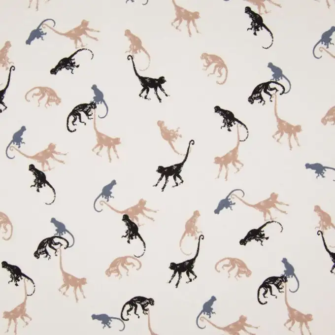 Tessuto velo di crepe ecru scimmie
