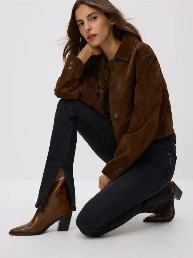 Jeans slim fit con spacco Colore nero