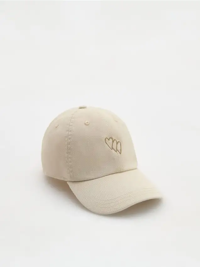 Cappello con visiera Colore beige