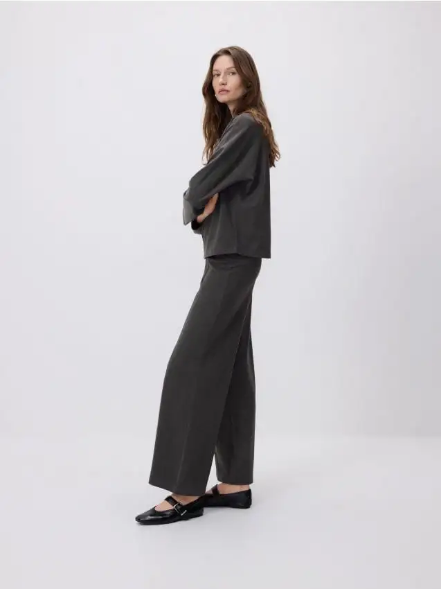 Pantaloni con impunture Colore multicolore