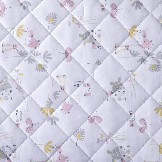 Tessuto trapuntato baci rosa