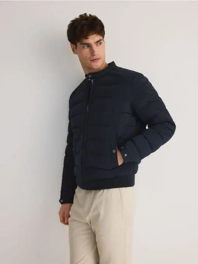 Giacca trapuntata a collo alto Colore blu scuro