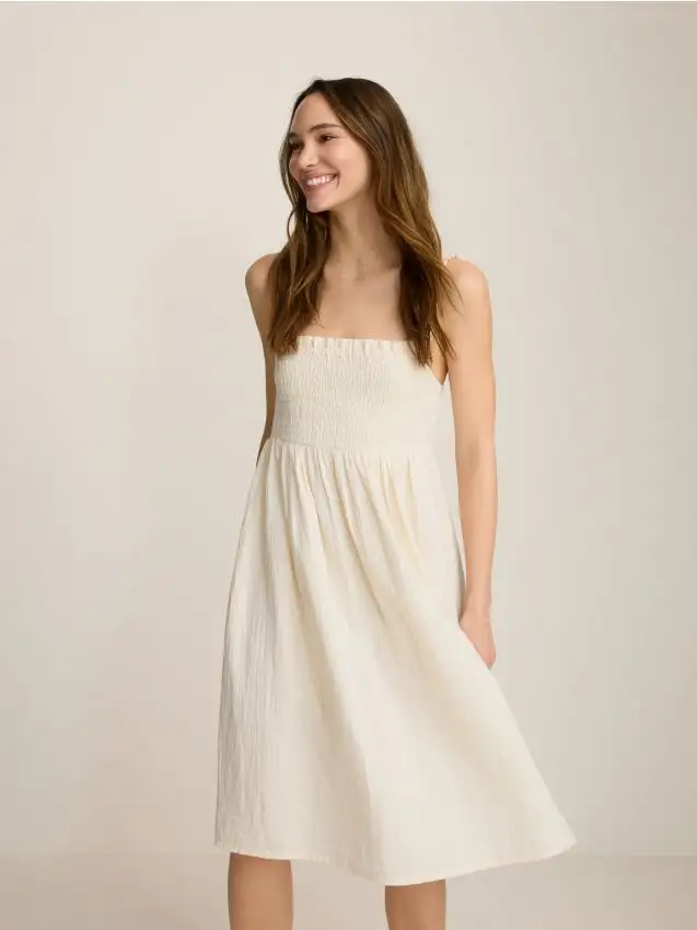 Abito in mussola con spalline Colore panna