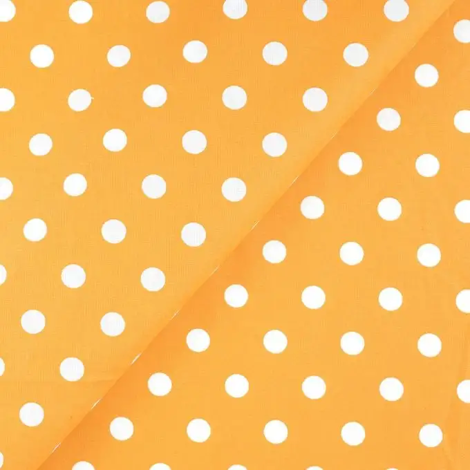 Tessuto cretonne giallo rivestito pois bianchi
