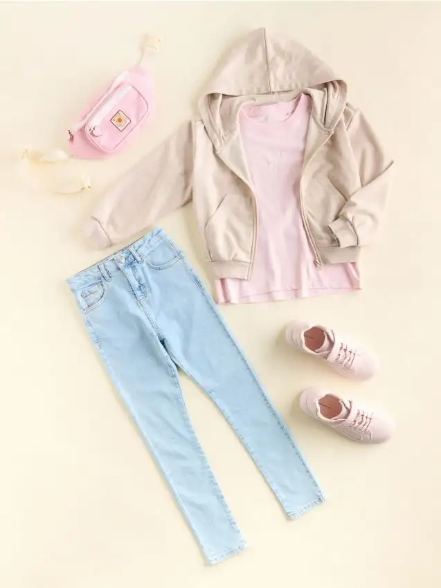 Jeans skinny fit con bottone a forma di cuore Colore blu