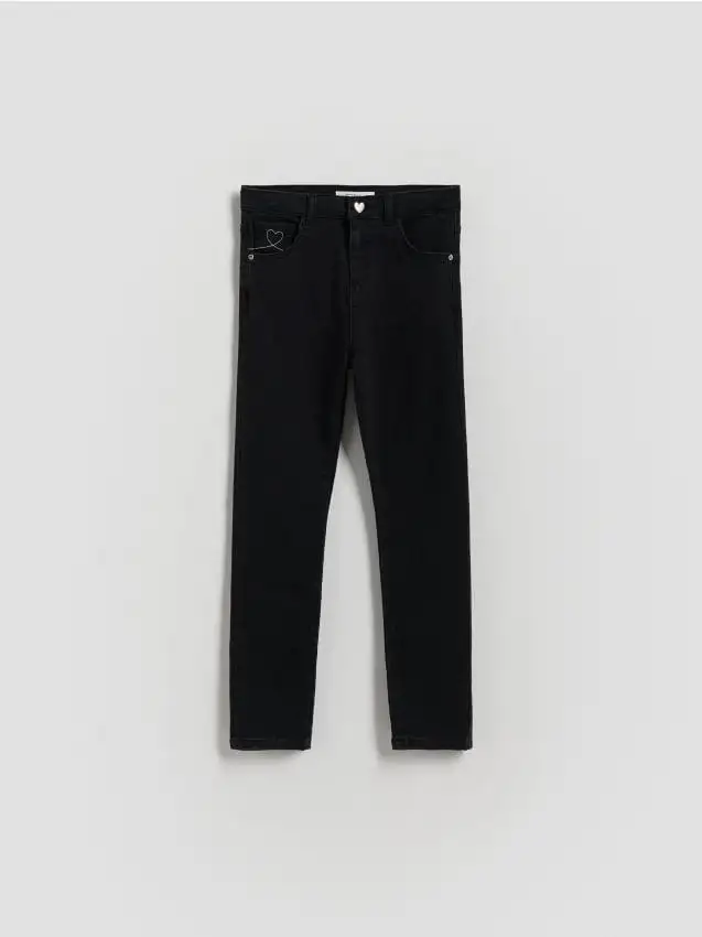 Jeans skinny fit con bottone a forma di cuore Colore grigio