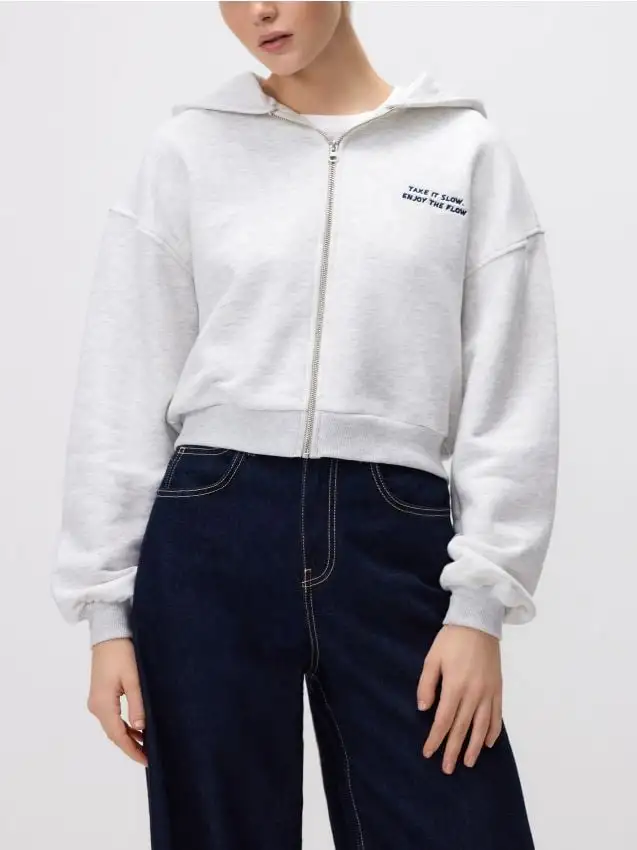 Top da jogging con zip e cappuccio Colore grigio chiaro