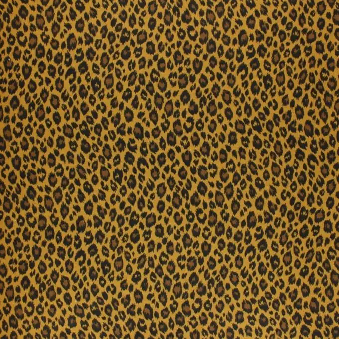 Tessuto in cotone stampato effetto leopardo giallo