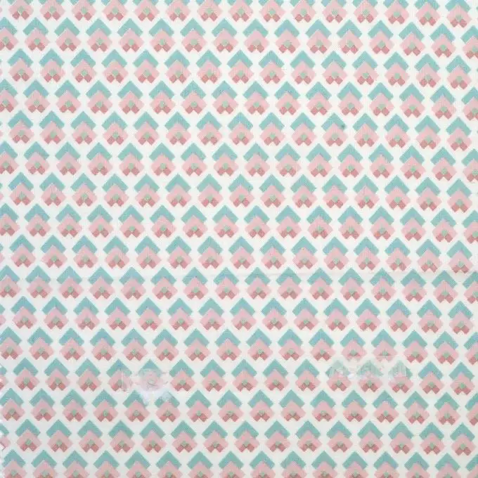 Tessuto geometrico verde e rosa
