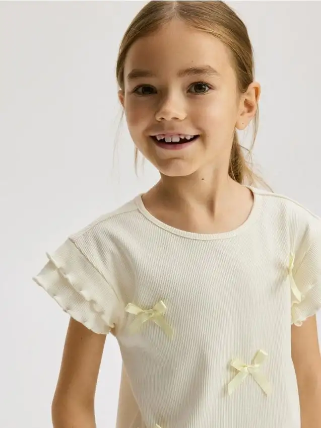 Camicetta con fiocchi Colore giallo chiaro