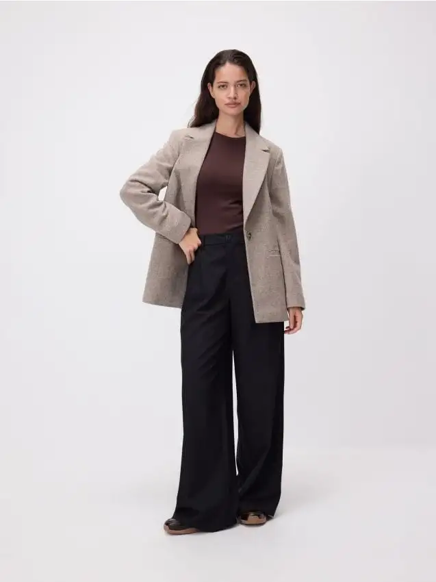 Pantaloni ampi con cintura Colore nero