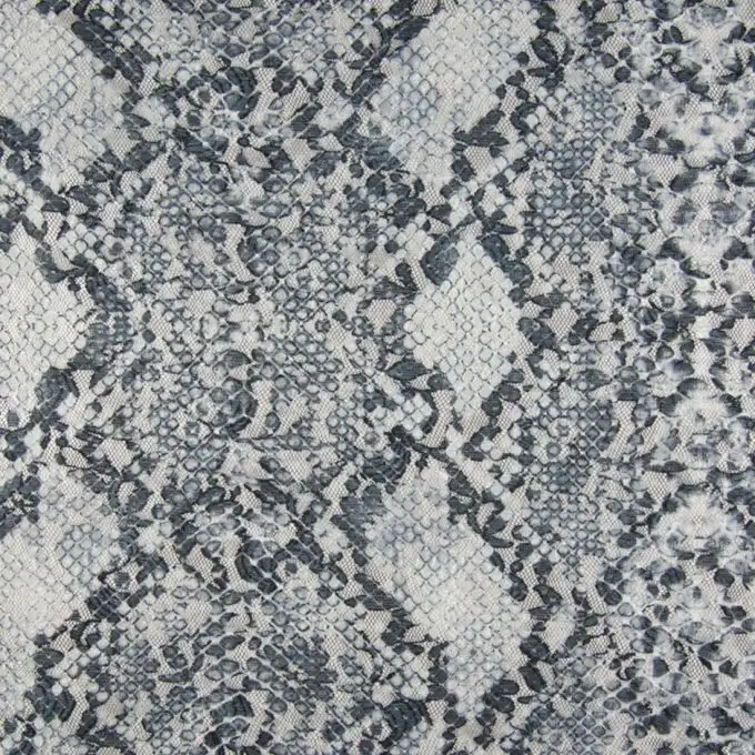 Tessuto pizzo elasticizzato rettile grigio