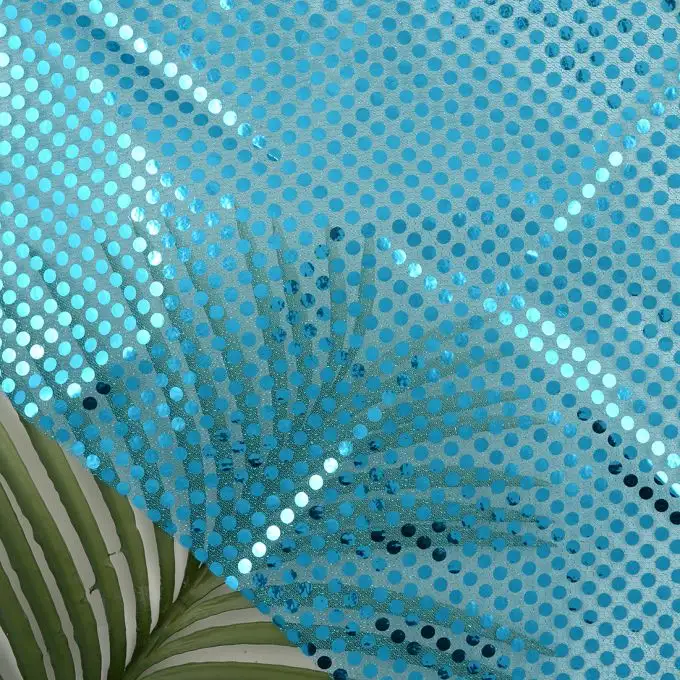 Tessuto tulle turchese paillettes