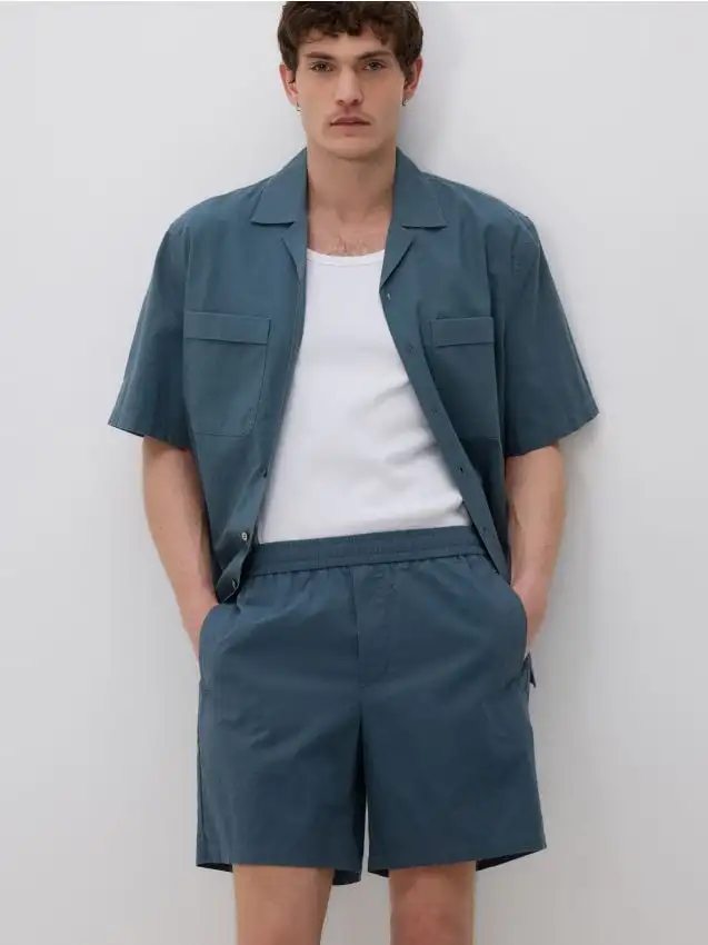 Shorts slim in misto lino Colore verde petrolio