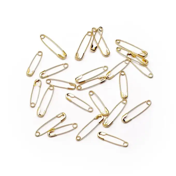 Spille in ottone assortite