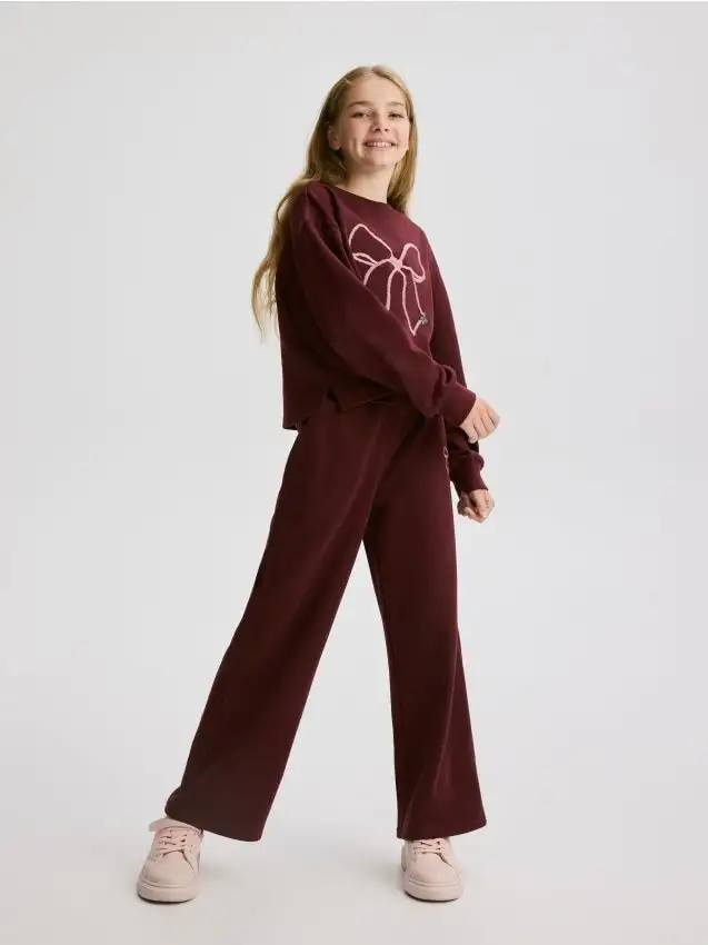 Completo da tuta con ricamo Colore maroon