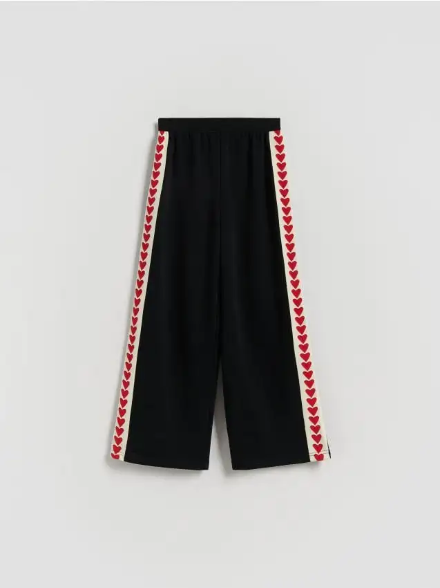 Pantaloni a gamba ampia con strisce laterali Colore nero